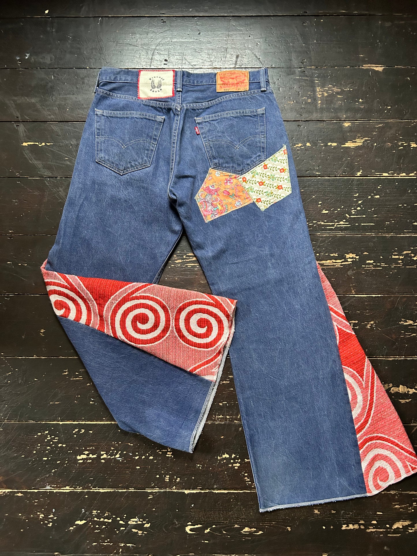 ORANGE SWIRL VINTAGE REWORKED LEVI'S 501's JEANS