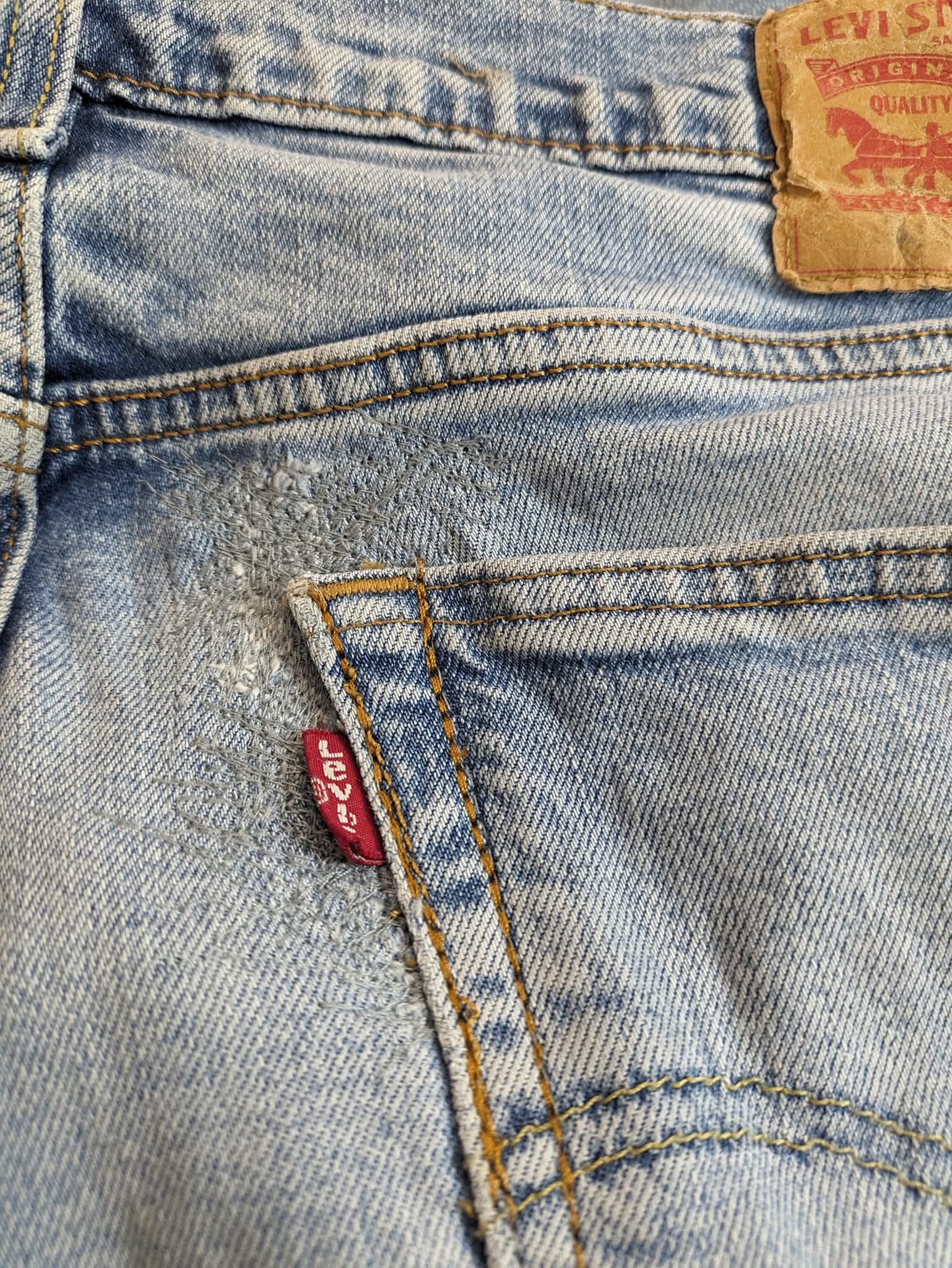 Close-up of Levi's jeans with brand logo and label.
