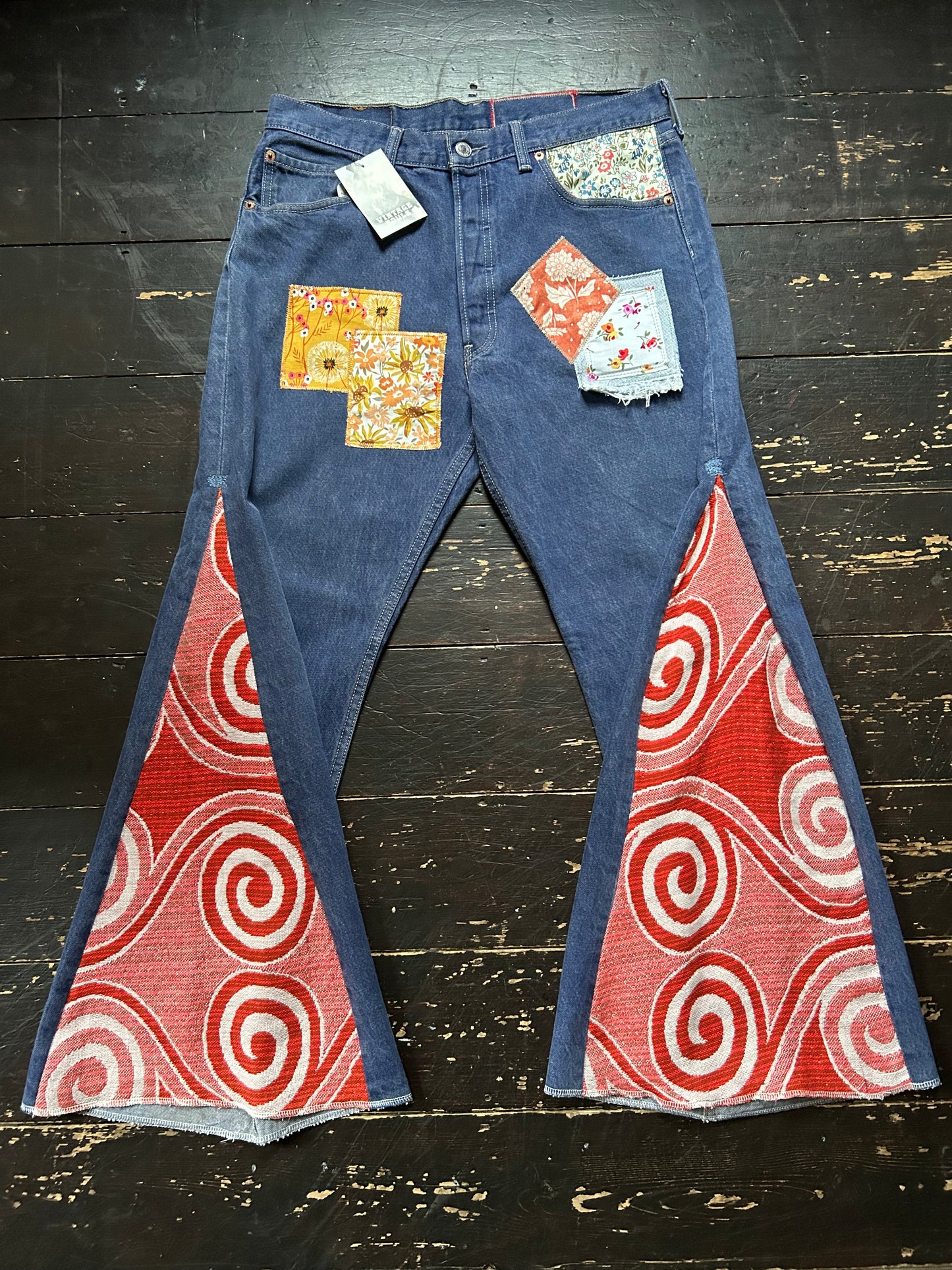 ORANGE SWIRL VINTAGE REWORKED LEVI'S 501's JEANS
